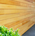 Houten sectionale garagedeur - Red Cedar - gelakt