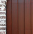 Houten sectionale garagedeur - verticale profilering - getoogd - Meranti - teak gebeitst